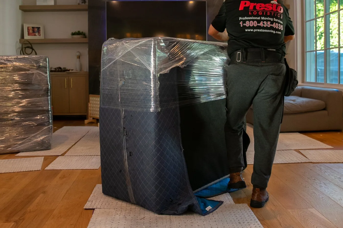 Furniture wrapped and padded by Presto movers, ready to load